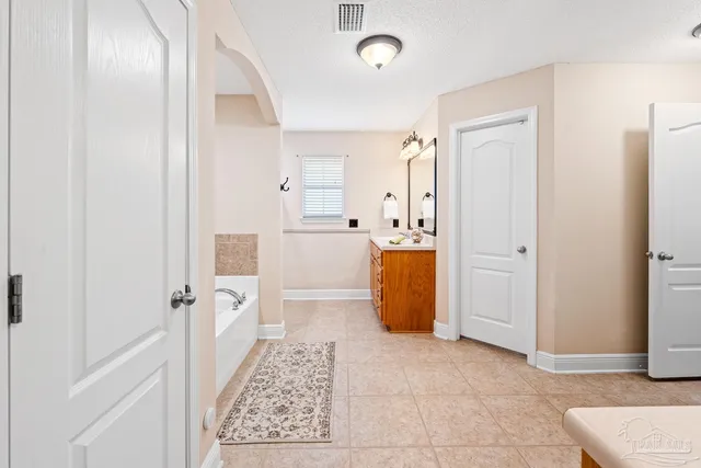 a bathroom with a toilet and a sink