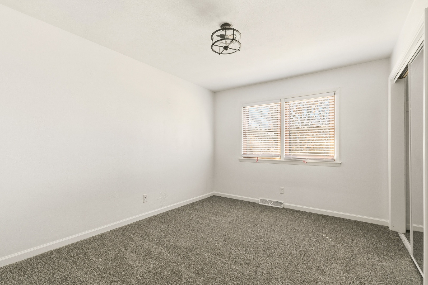 11622 27th Street West Milan, IL 61264 - Photo 28 of 49 an empty room with a window