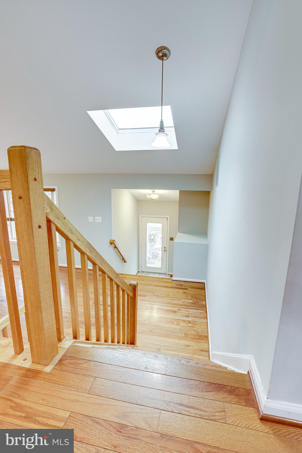 13 Rutledge Court Sterling, VA 20165 - Photo 22 of 98 Stairs leading down to Living Area and Front Door
