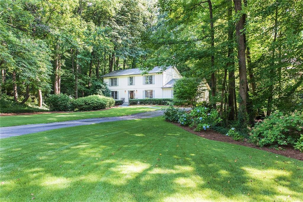 Your dream front yard awaits! Flat. Perfectly landscaped. Just beautiful! 