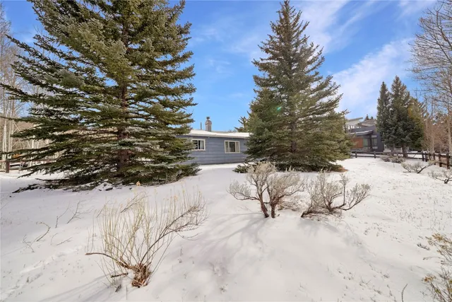 a view of a snow on the road