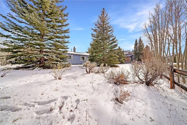 a view of snow on the road