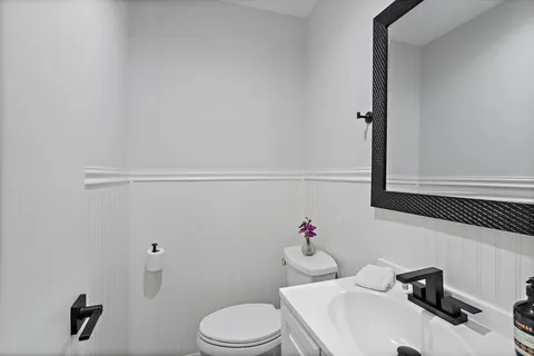 a bathroom with a sink and a toilet