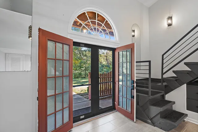 a view of an entryway with a hallway