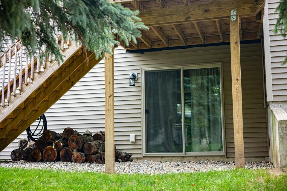 451 Tentree Street Sparta, MI 49345 - Photo 26 of 28 underneath deck slider to lower level