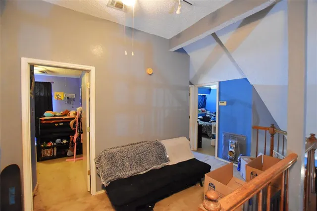 a bathroom with a sink and mirror with toilet