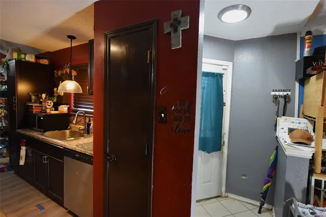 a bathroom with a sink a mirror and shower