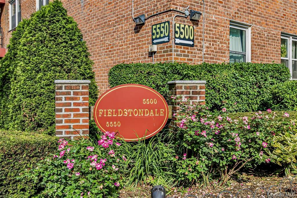 5550 Fieldston Road, Unit 1C ON 2 Bronx, NY 10471 - Photo 1 of 22 a blue sign that is sitting in front of a house