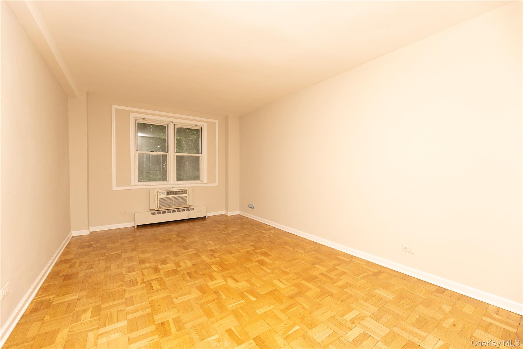 5550 Fieldston Road, Unit 1C ON 2 Bronx, NY 10471 - Photo 11 of 22 an empty room with windows