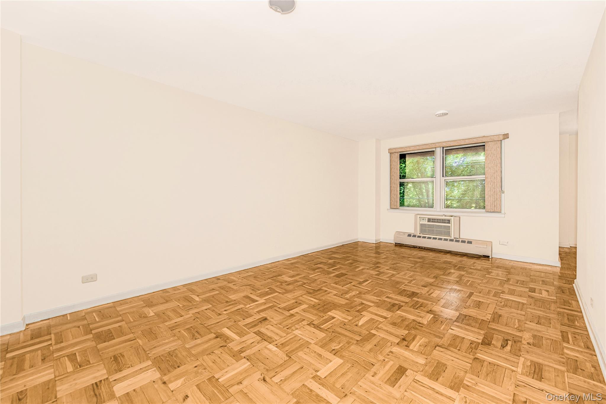 5550 Fieldston Road, Unit 1C ON 2 Bronx, NY 10471 - Photo 13 of 22 a view of a bedroom with a window
