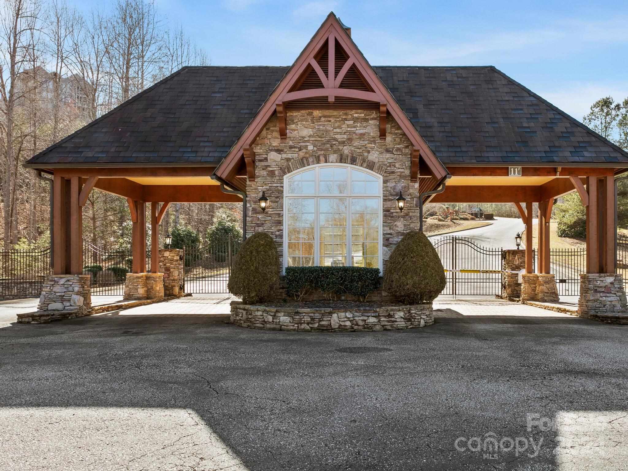0 Golden Ridge Drive, Unit 133 Lake Lure, NC 28746 - Photo 6 of 14 a front view of a house