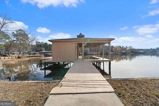 a front view of a house with lake view