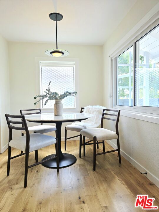 2520 Midvale Avenue Los Angeles, CA 90064 - Photo 9 of 25 a view of a dining room with furniture window and outside view