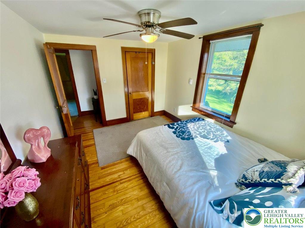 244 Learn Road Tannersville, PA 18372 - Photo 11 of 69 a bedroom with a bed and a window