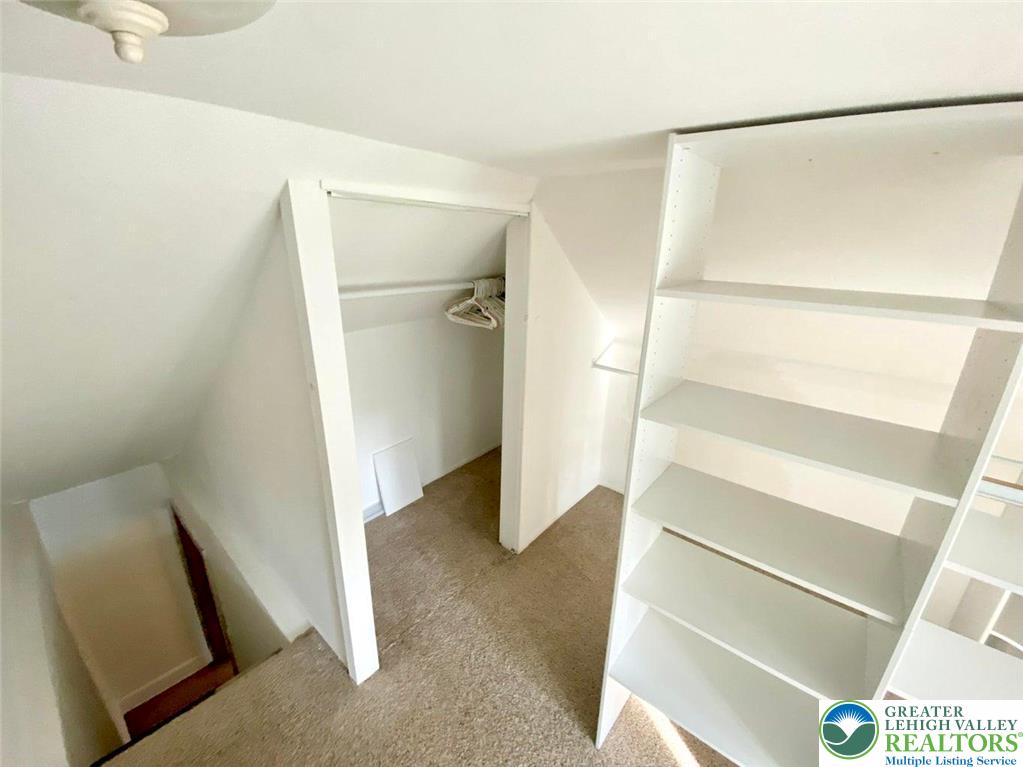 244 Learn Road Tannersville, PA 18372 - Photo 13 of 69 a view of walk in closet with empty racks