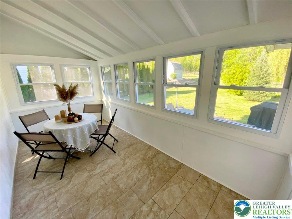 244 Learn Road Tannersville, PA 18372 - Photo 33 of 69 a dining room with furniture and a window