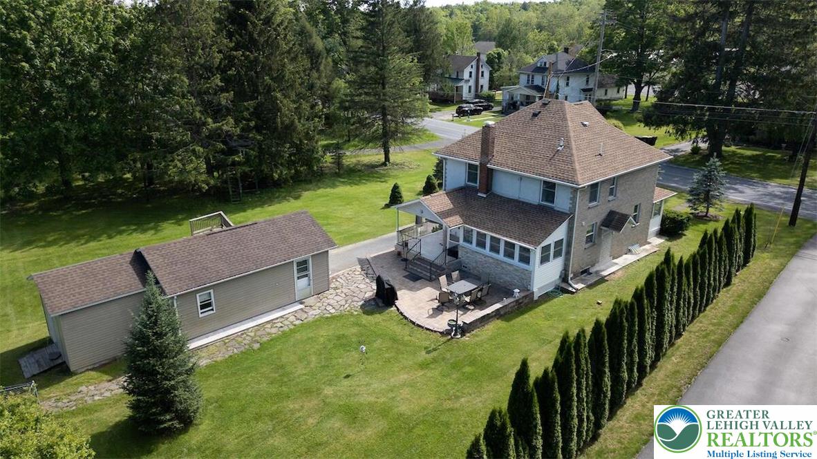 244 Learn Road Tannersville, PA 18372 - Photo 4 of 69 an aerial view of a house with a garden