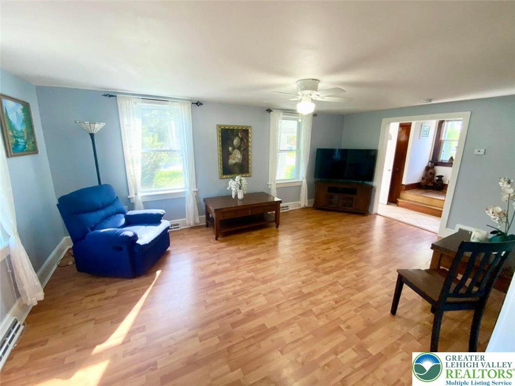 244 Learn Road Tannersville, PA 18372 - Photo 44 of 69 a living room with furniture and a flat screen tv