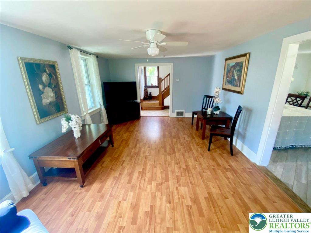 244 Learn Road Tannersville, PA 18372 - Photo 51 of 69 a living room with furniture and a wooden floor