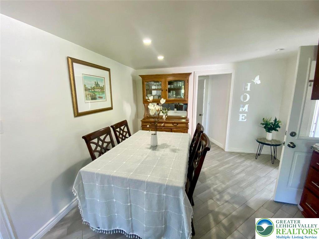 244 Learn Road Tannersville, PA 18372 - Photo 54 of 69 a living room with furniture and a potted plant