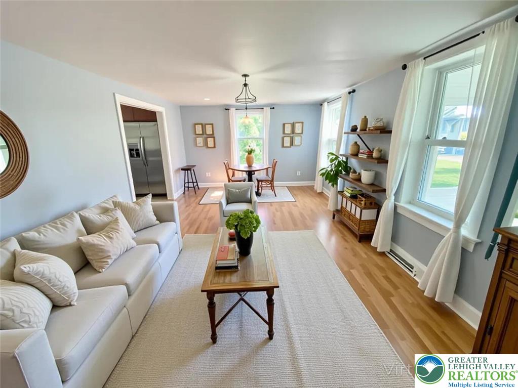244 Learn Road Tannersville, PA 18372 - Photo 57 of 69 a living room with furniture and a large window