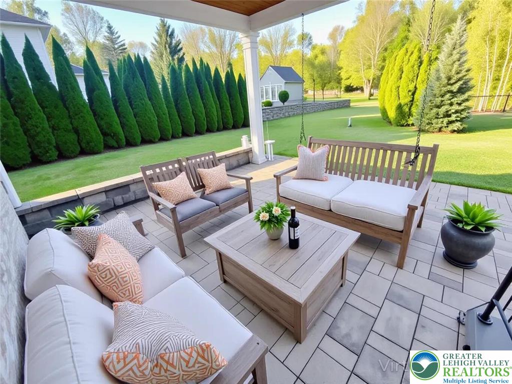244 Learn Road Tannersville, PA 18372 - Photo 63 of 69 a view of a patio with couches and a table and chairs with wooden fence