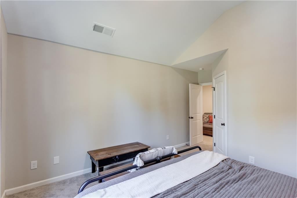 6137 Timberidge Drive Gainesville, GA 30506 - Photo 29 of 50 a room with a bed and a window