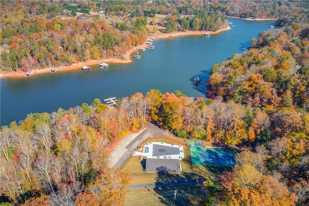 6137 Timberidge Drive Gainesville, GA 30506 - Photo 37 of 50 an aerial view of a house with a lake view