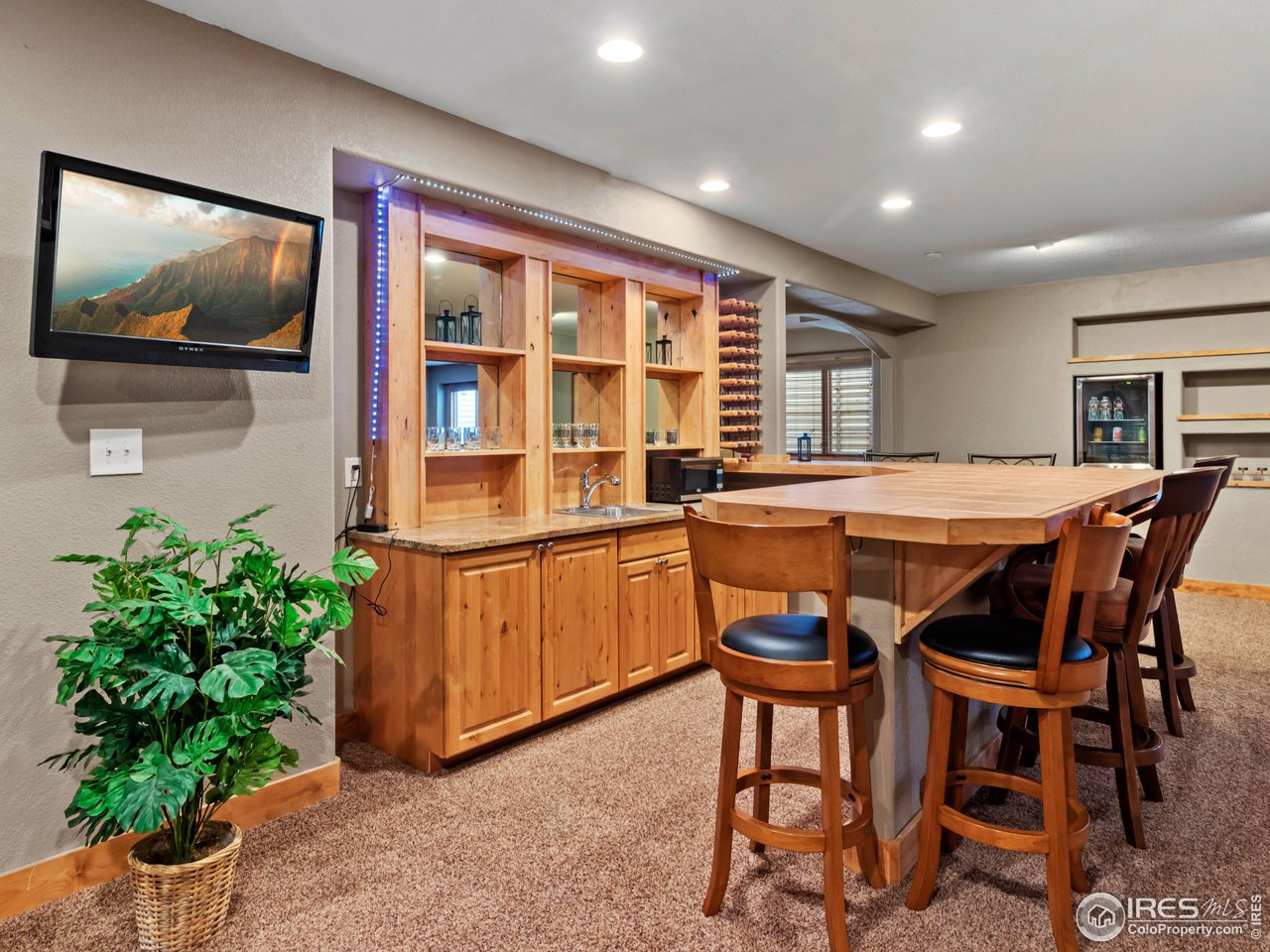 8193 Admiral Drive Windsor, CO 80528 - Photo 29 of 39 a dinning table and chairs in a room