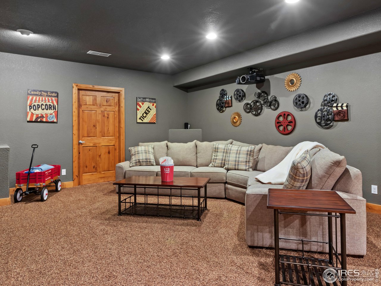 8193 Admiral Drive Windsor, CO 80528 - Photo 31 of 39 a living room with furniture and white walls
