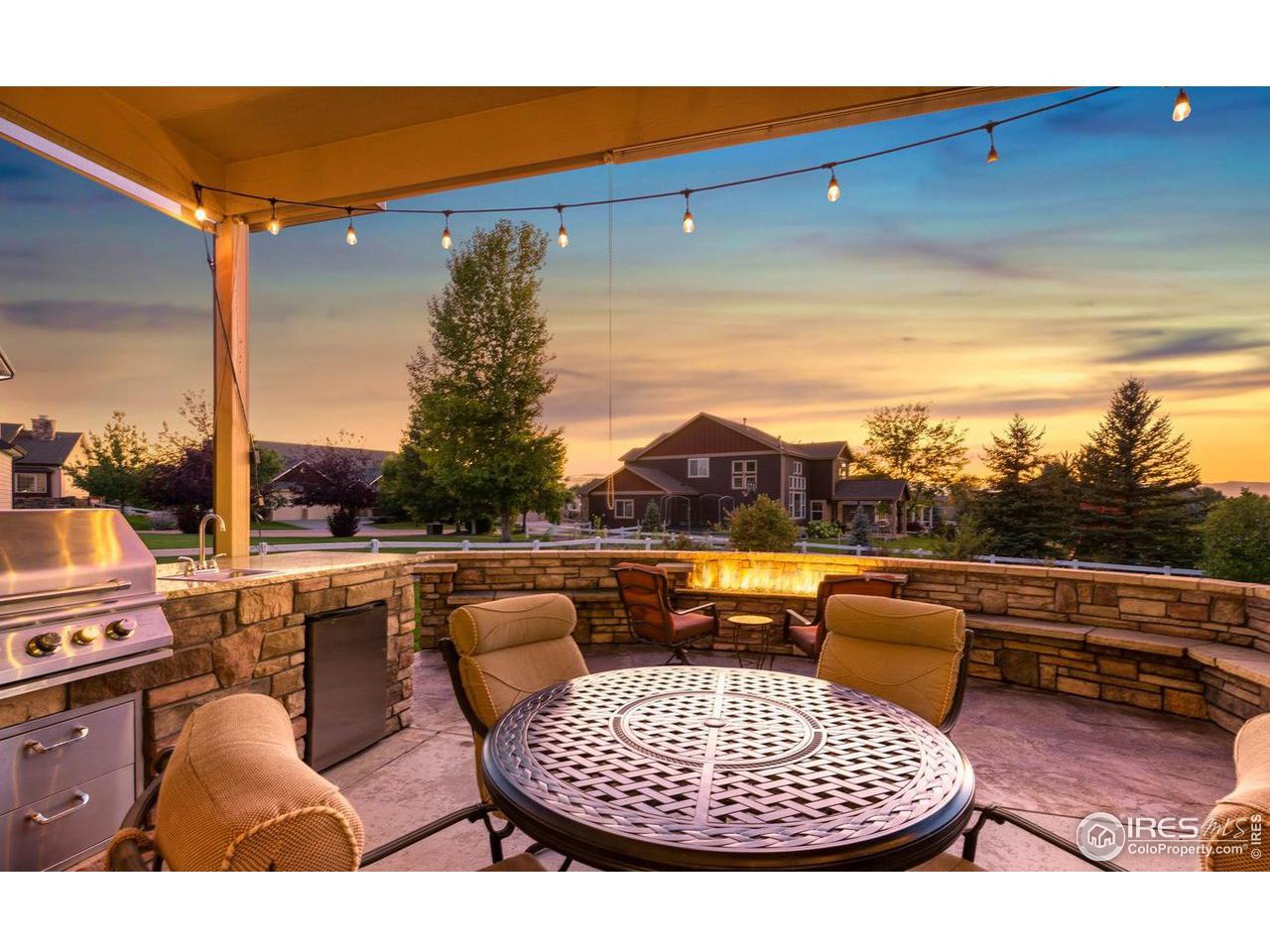 8193 Admiral Drive Windsor, CO 80528 - Photo 5 of 39 a view of roof deck with couches table and chairs