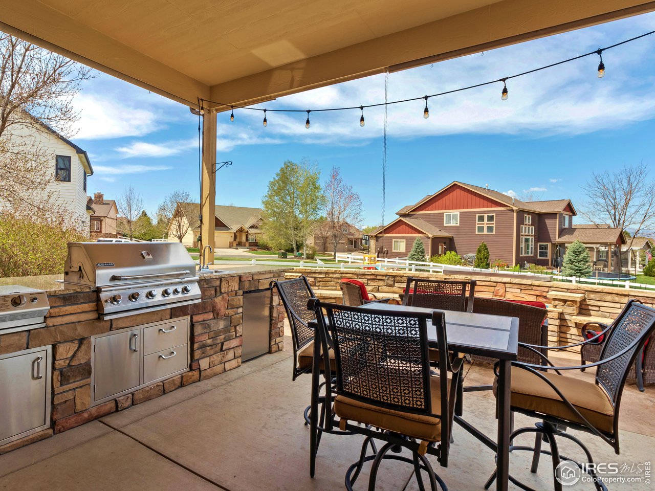 8193 Admiral Drive Windsor, CO 80528 - Photo 7 of 39 a view of a chairs and table in the patio