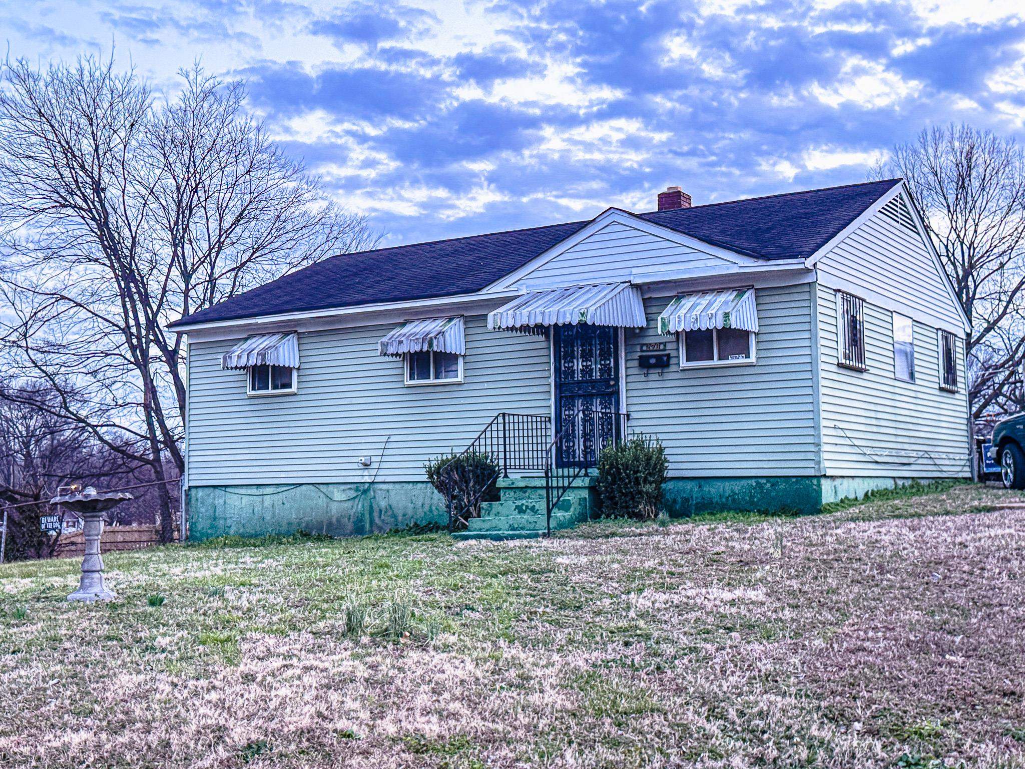273 Carbon Road Memphis, TN 38109 - Photo 1 of 2 View of front of house featuring a chimney