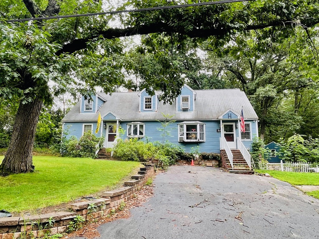 84 Myrtle Street Methuen, MA 01844 - Photo 1 of 1 a front view of a house with a yard