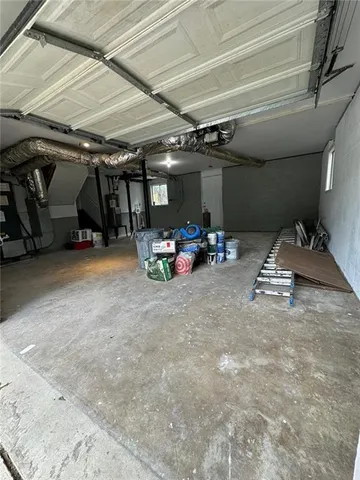 a view of parking garage with cars