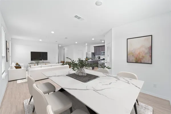 a view of a dining room with furniture