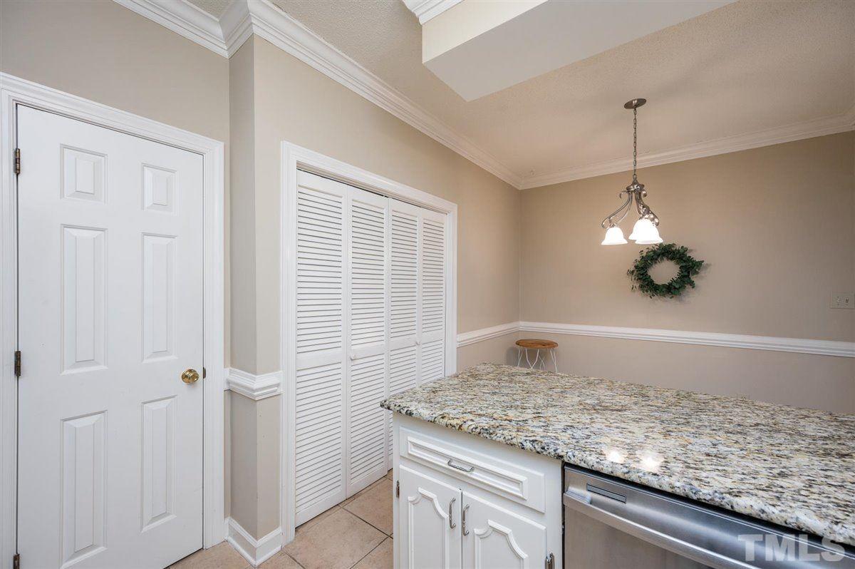 7921 Footman Way Raleigh, NC 27615 - Photo 12 of 28 a kitchen with sink and window