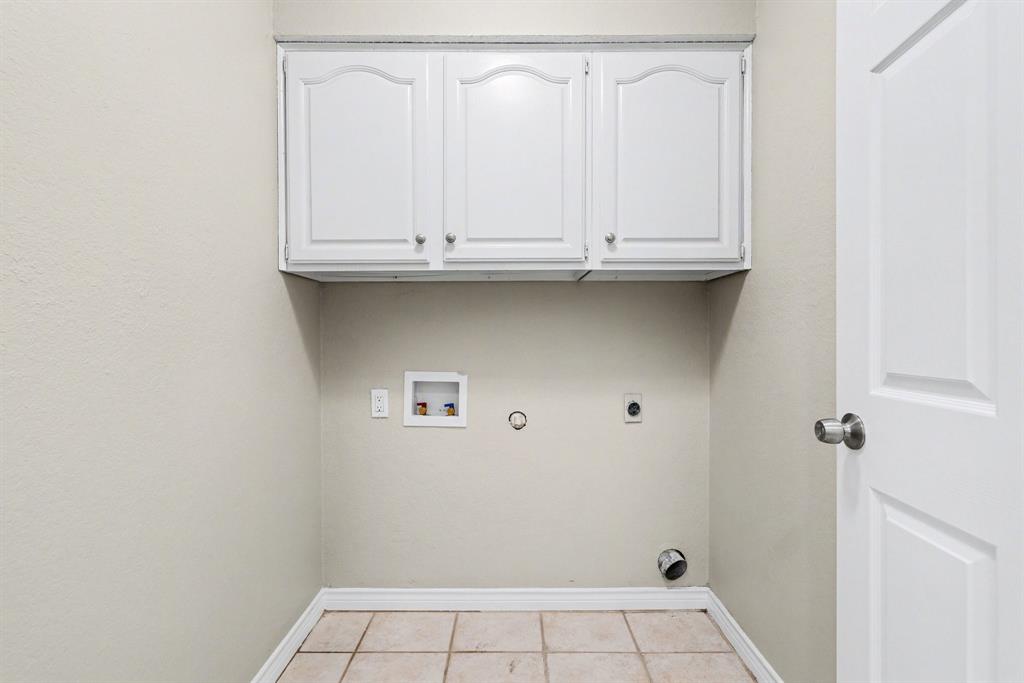 505 Springhill Drive Hurst, TX 76054 - Photo 12 of 25 a close view of a utility room with a sink