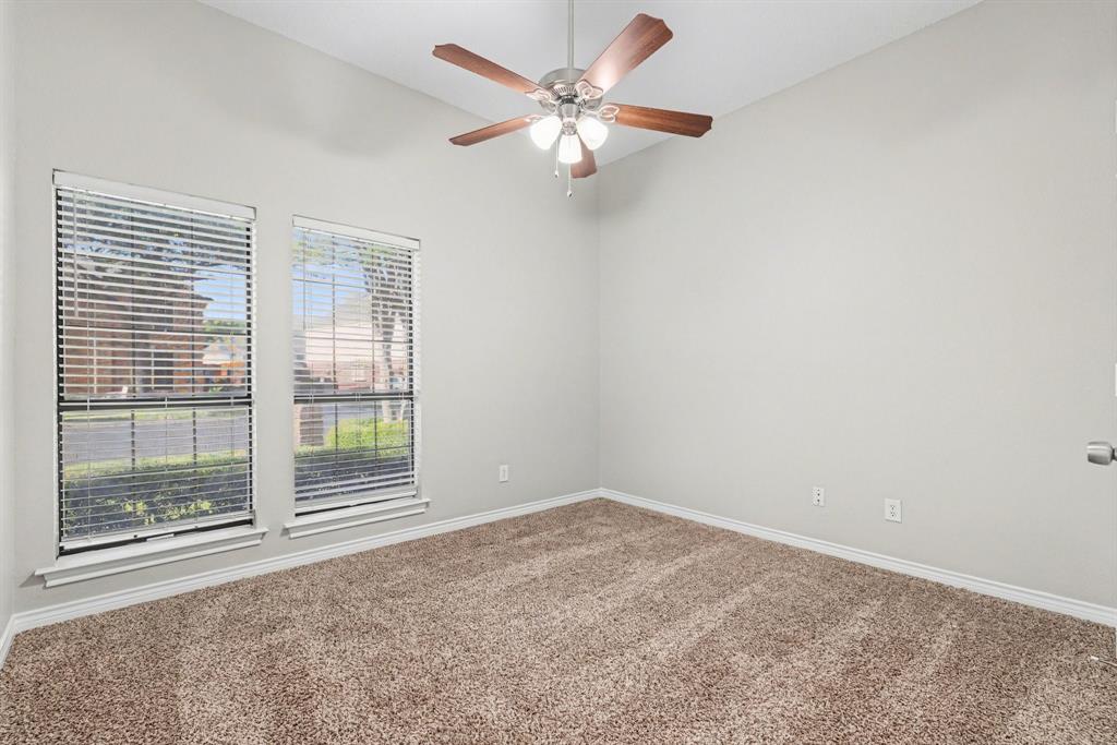 505 Springhill Drive Hurst, TX 76054 - Photo 18 of 25 a view of an empty room with a window