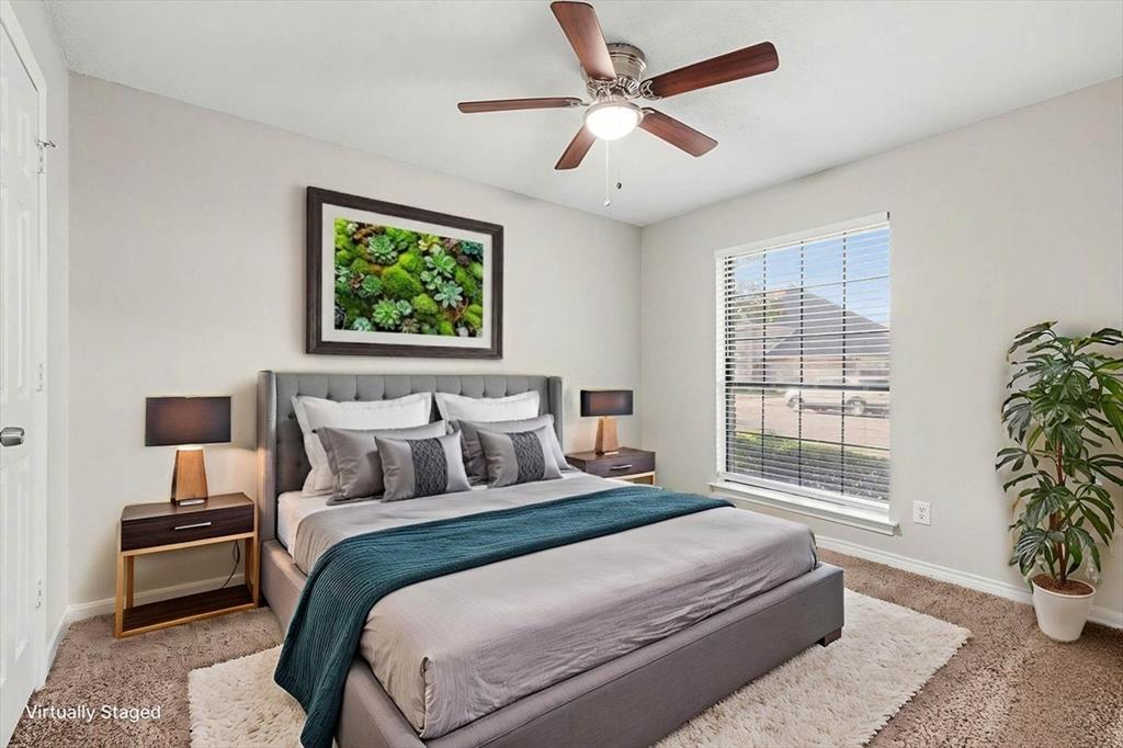 505 Springhill Drive Hurst, TX 76054 - Photo 20 of 25 a bedroom with bed and a window