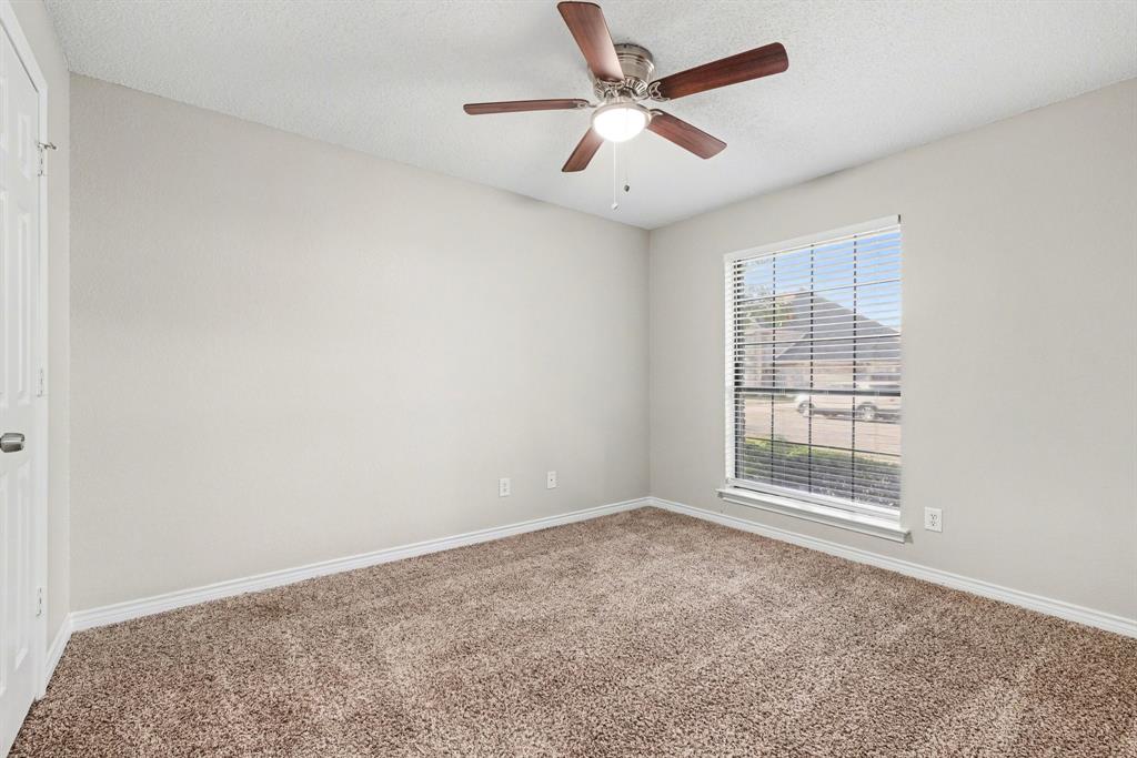 505 Springhill Drive Hurst, TX 76054 - Photo 21 of 25 an empty room with a window