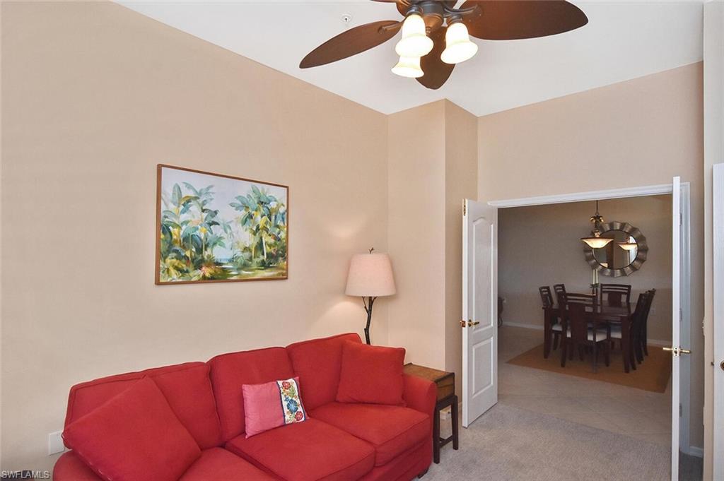 3870 Sawgrass Way, Unit 2521 Naples, FL 34112 - Photo 20 of 46 a living room with furniture