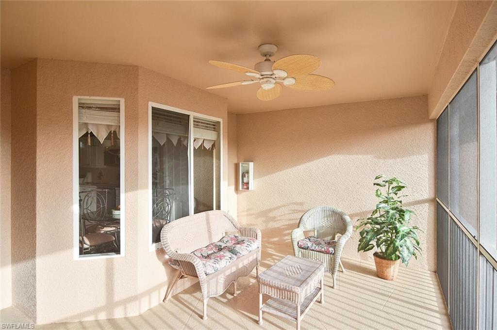 3870 Sawgrass Way, Unit 2521 Naples, FL 34112 - Photo 7 of 46 a living room with furniture