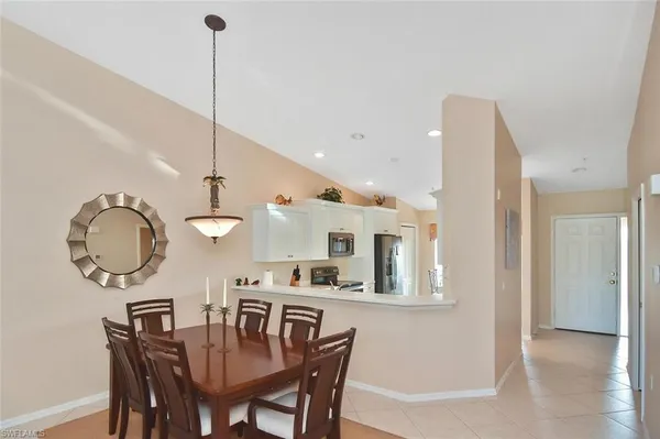 a view of a dining room and chandelier