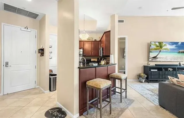 $695,000 | 403 South Sapodilla Avenue, Unit 104, West Palm Beach, FL 33401