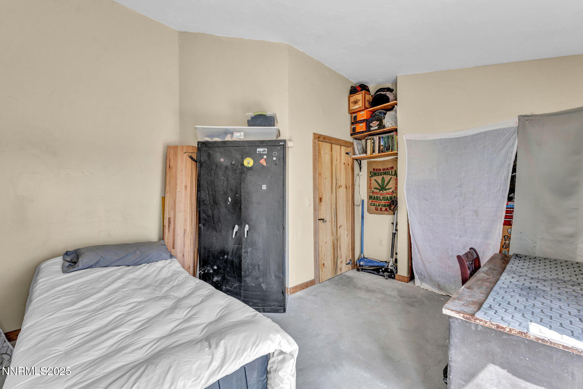 14995 Coal Canyon Road Lovelock, NV 89419 - Photo 17 of 37 a bedroom with a bed and a couch