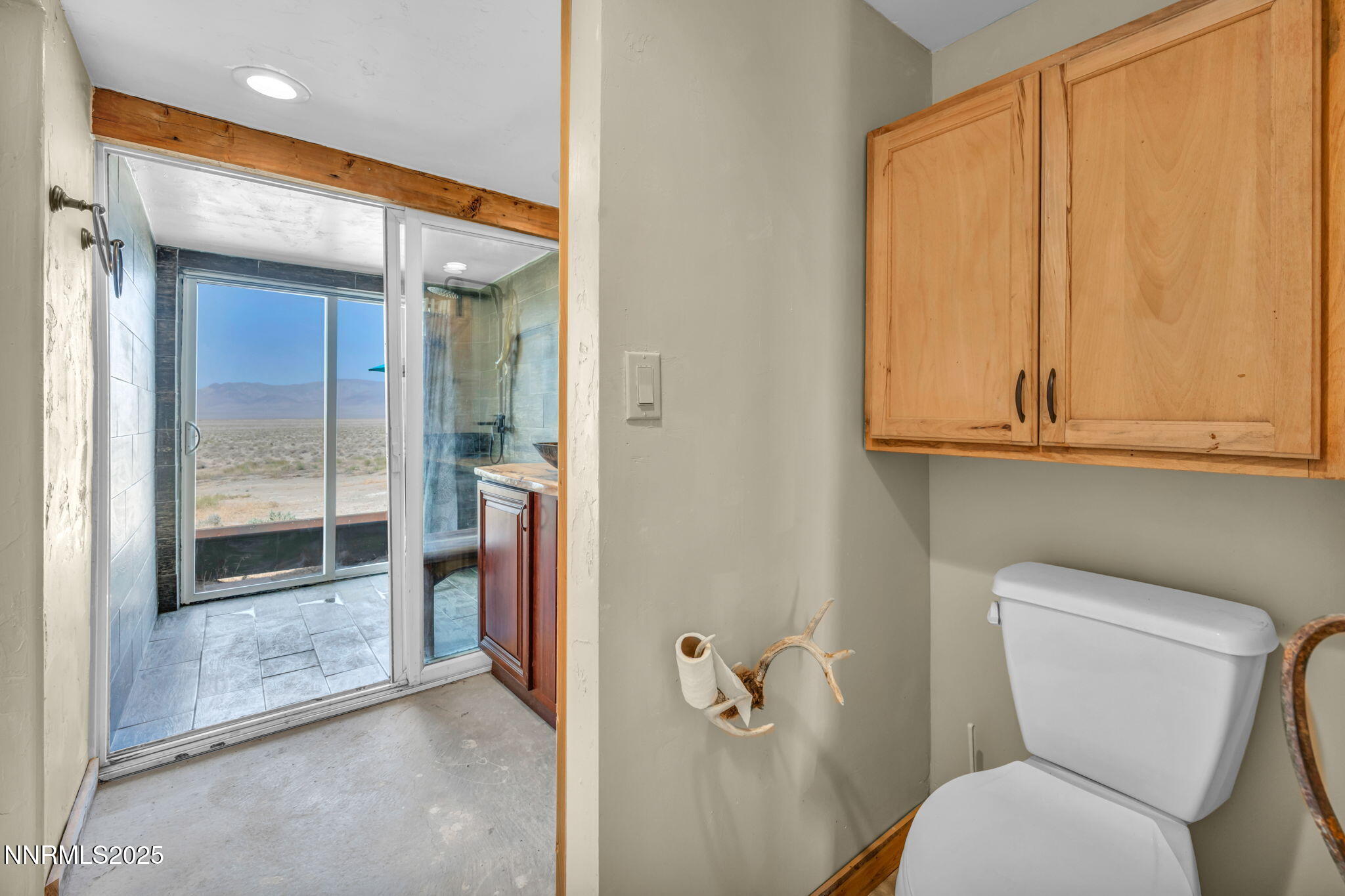 14995 Coal Canyon Road Lovelock, NV 89419 - Photo 25 of 37 a bathroom with a toilet and a shower