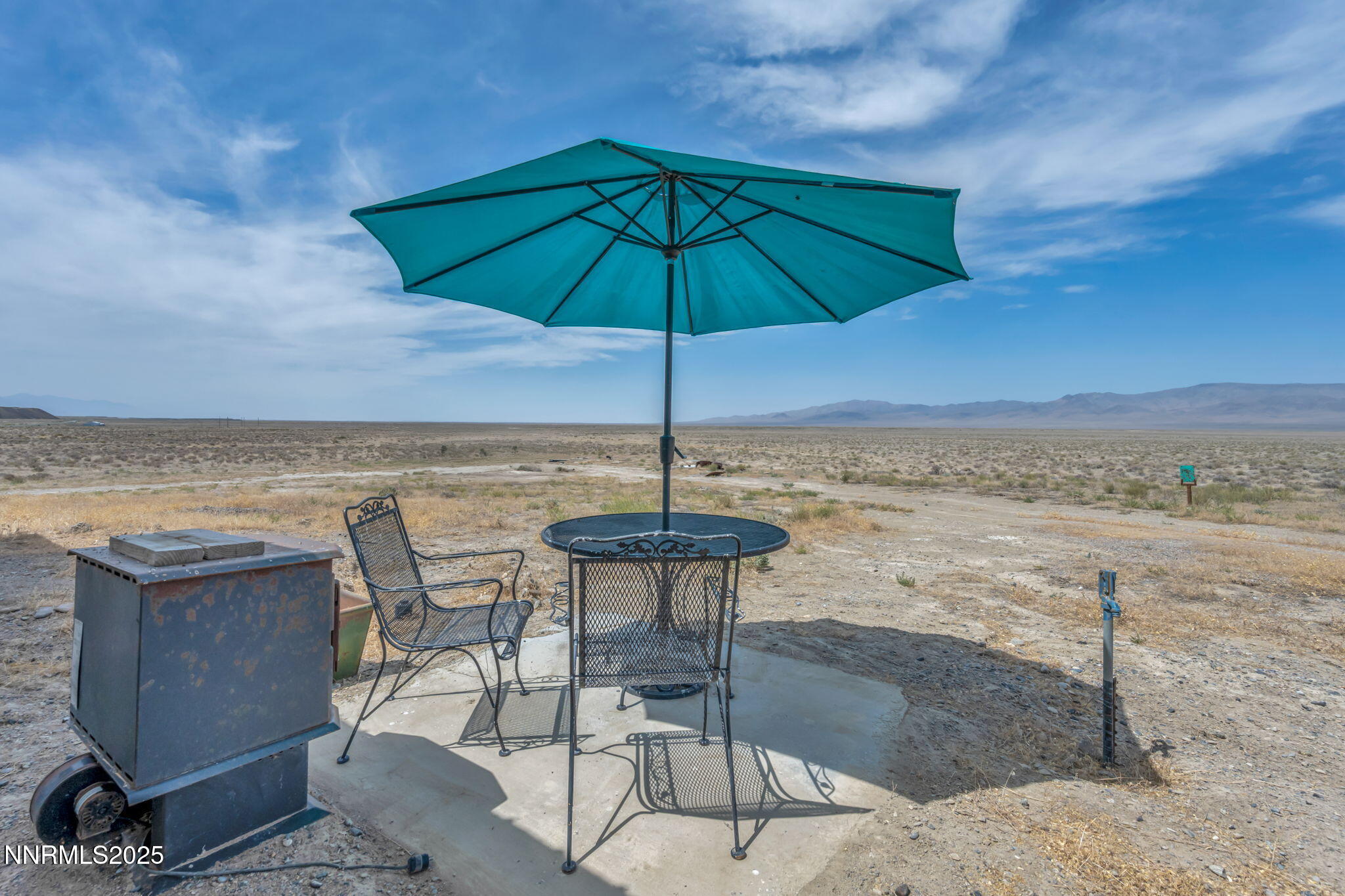 14995 Coal Canyon Road Lovelock, NV 89419 - Photo 30 of 37 a table and chairs in a patio