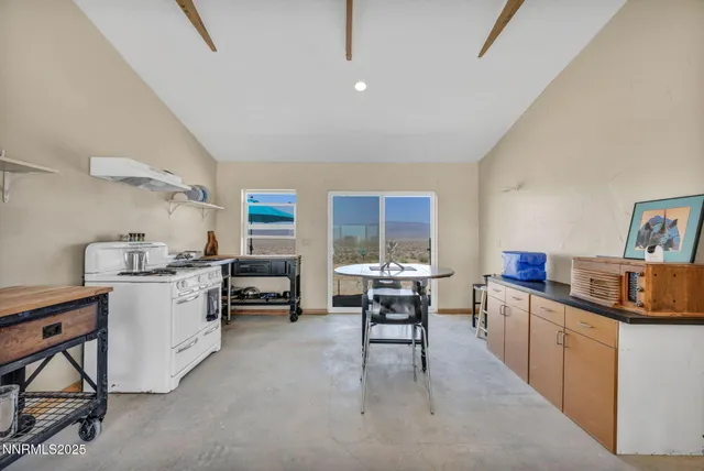 a kitchen with sink and cabinets