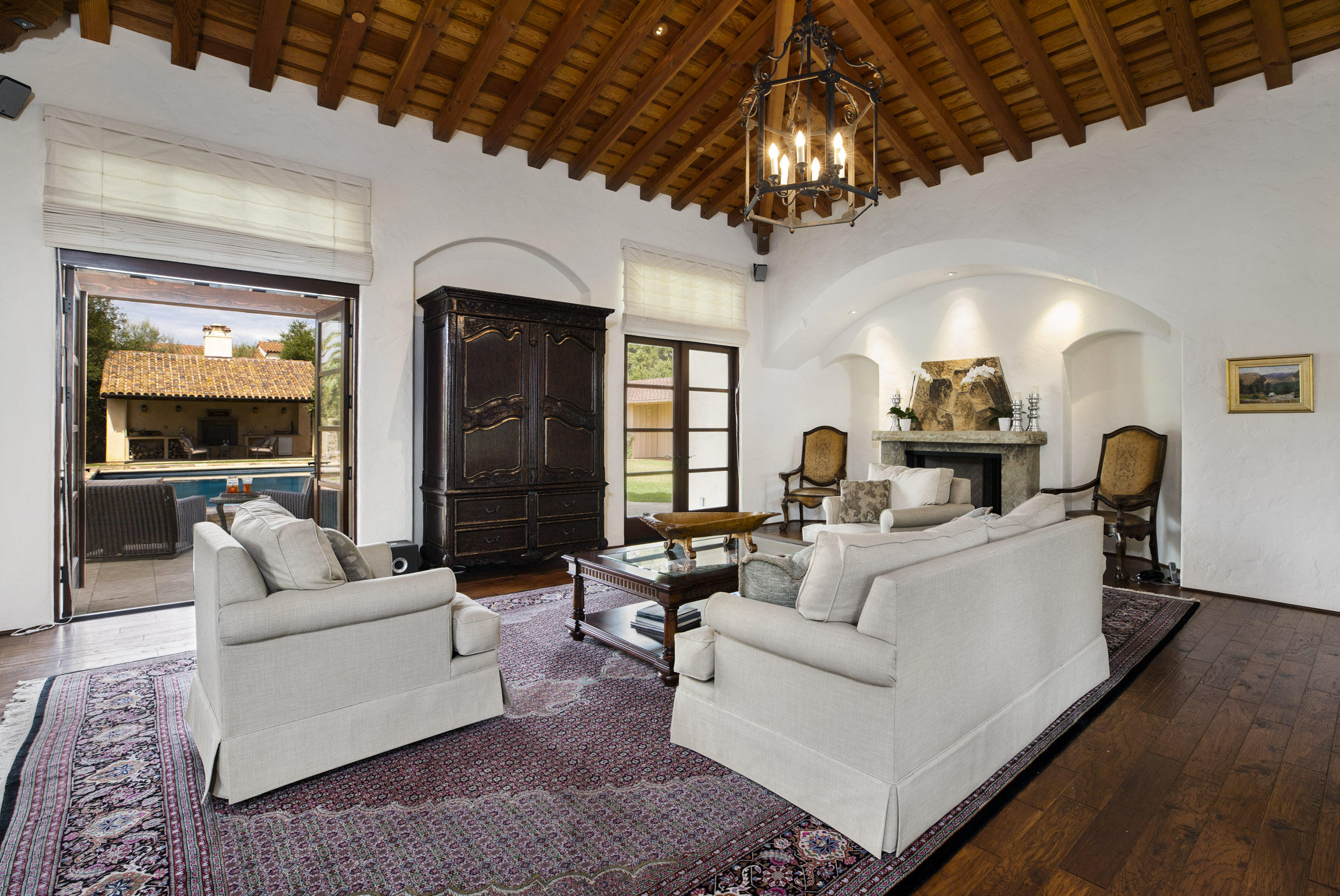 615 Hot Springs Road Montecito, CA 93108 - Photo 4 of 23 a living room with furniture and a large window